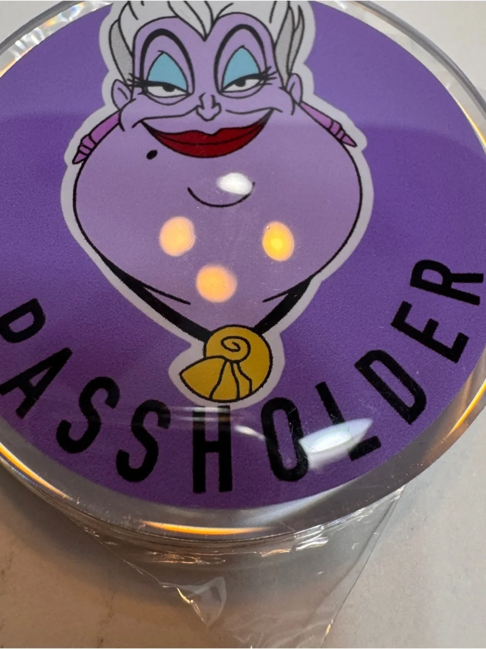 Handmade phone grip of Ursula the sea witch and “PASSHOLDER”